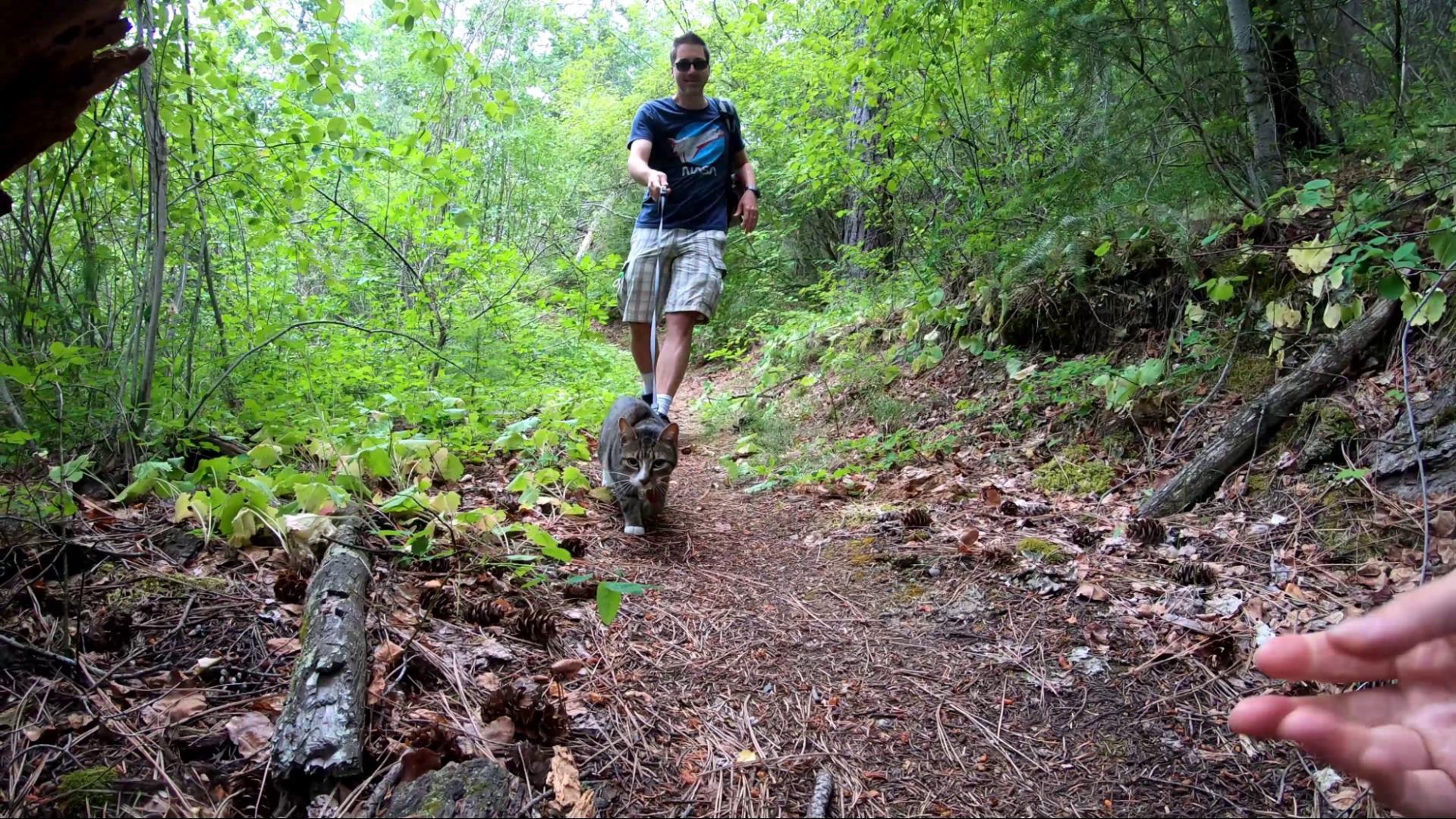 Benny walking the trail with Jay coming down from Goat's Bluff at Skihist Provincial Park, British Columbia, Canada.